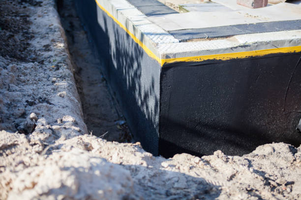 Professional Emergency Waterproofing technician working in Edgerton, OH